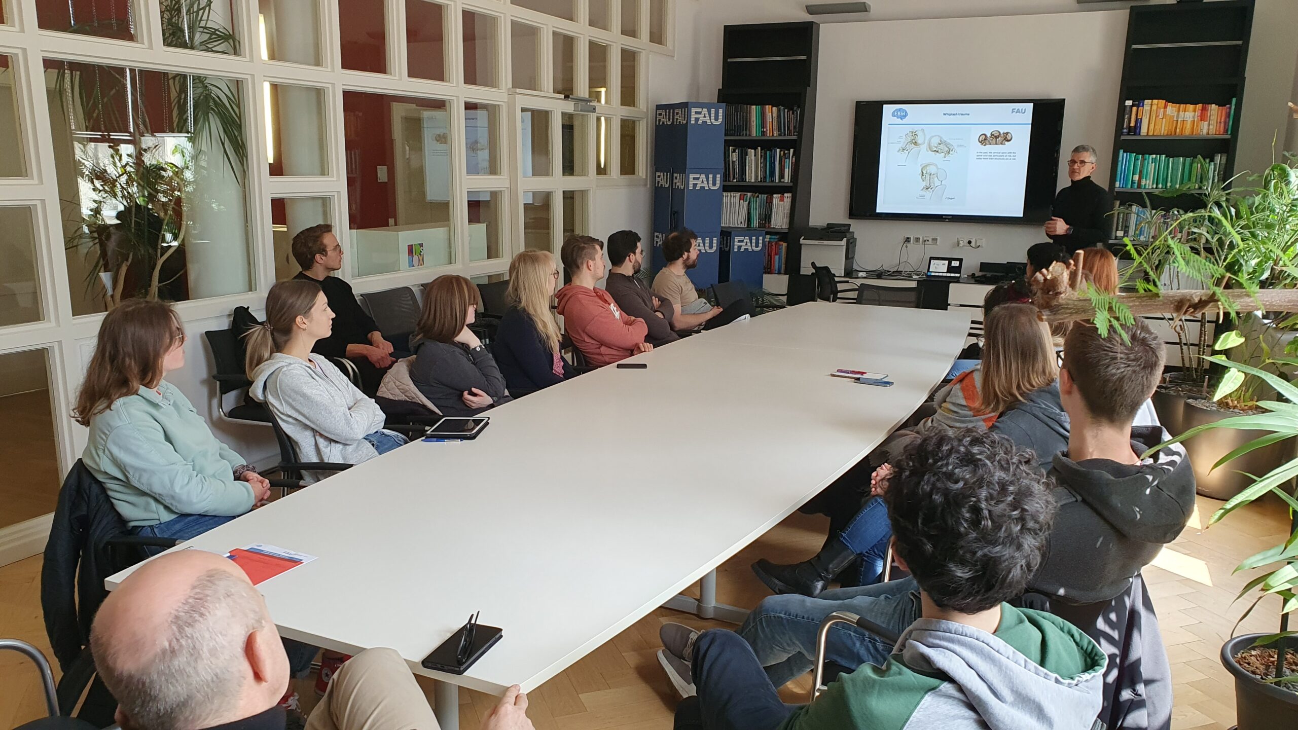 Impressions of the EBM harmonization workshop on neuroanatomy: EBM members in the seminar room listening to Prof. Friedrich Paulsen's lecture. CRC 1540 Exploring Brain Mechanics